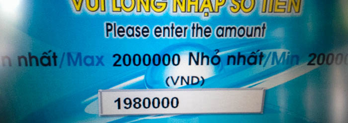 Withdrawing 1,980,000 VND from an ATM